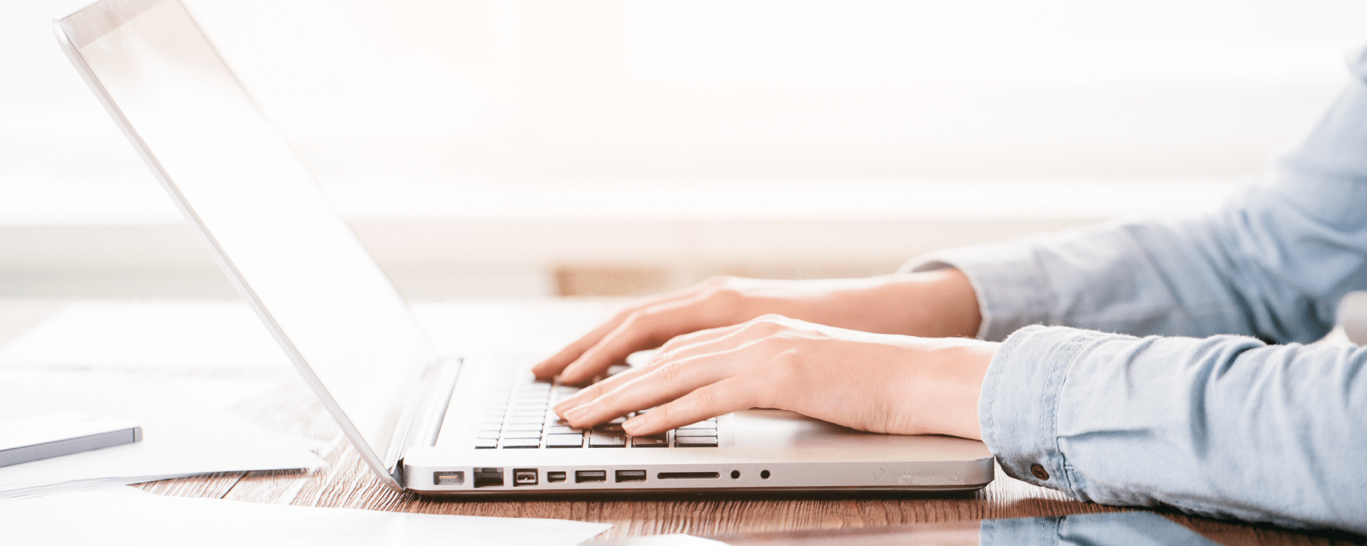 CENTAUR software | man using laptop with hands resting on keyboard